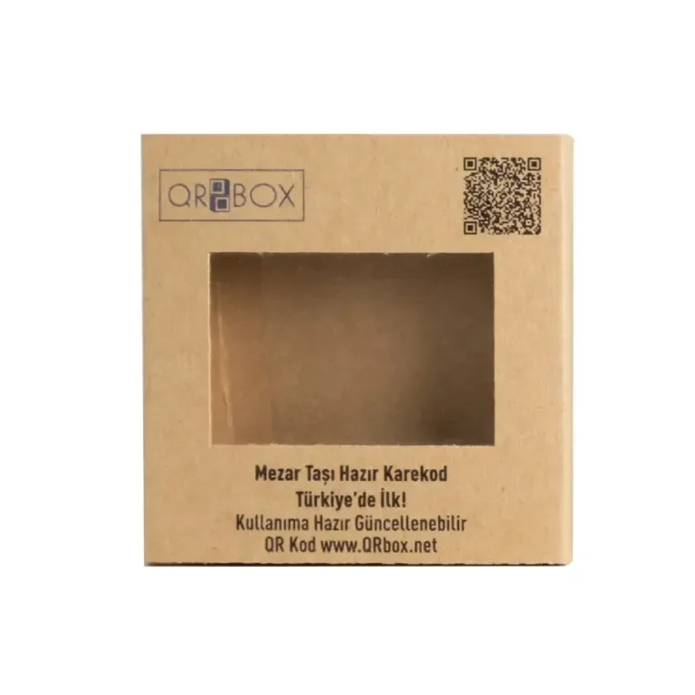 Custom printed raw paper window box: folding carton with a shield-shaped die-cut window and clear film patch, used as medical device packaging